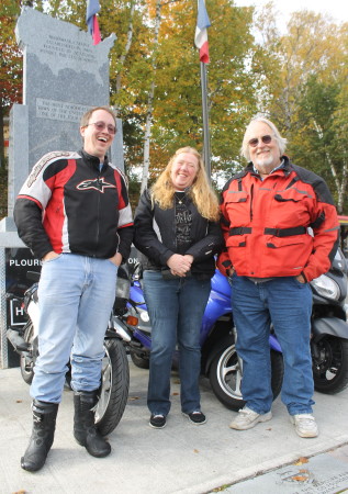 Three of the drivers in this year's "Real Cannonball" race from Imperial Beach, California to Four Corners Park in Madawaska, arrived Wednesday, Oct. 5. Tim Gron, right, was the first driver into town early Wednesday night. Gron finished first in the scooter category, followed by Linda Hurley, center, who arrived within an hour of Gron. Ray Hixon, left, also arrived early Wednesday night and came in first in the motorcycle category. Don Eno | SJVT / FhF)
