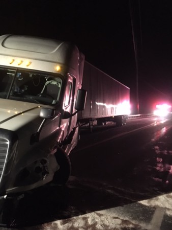 The driver of this tractor trailer received minor injuries after a collision with a minivan on U.S. Route 1 in Grand Isle on Monday evening, Nov. 28, 2016. (Contributed photo)