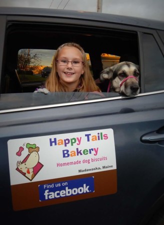 Brooke Levesque, 8, of Madawaska, seen here with Sasha, started her own dog treat business in the fall of 2016. (Contributed photo)