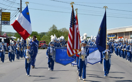The Pride of Madawaska Marching band, seen here at a 2102 Memorial Day parade in Madawaska, Maine, has been invited the 58th Presidential Inauguration in Washington, D.C. (SJVT / FhF image)