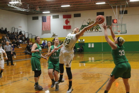 Lady Bengal Ashley Sauri commands a rebound during a home game against the Machias Clippers at the University of Maine at Fort Kent Sport Center on Friday, February 11. (Jessica Potila | SJVT/FhF)