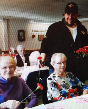 "Big Rick" Nadeau delivered pizza and flowers to residents at Le Maison Acadienne in Madawaska on Valentine's Day, 2017. (Contributed photo)