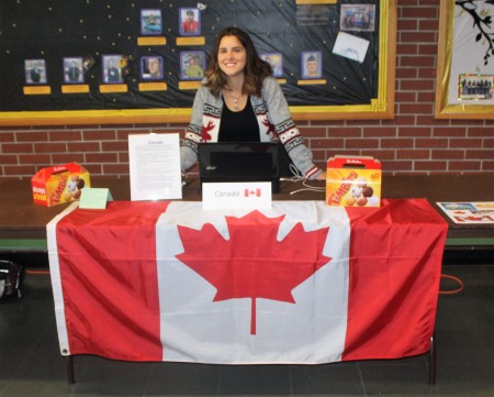 University of Maine at Fort Kent student Catherine Bruno, originally from Montreal, shared donut holes and information about her home country at an international students forum at UMFK on Thursday, March 2. (Jessica Potila | SJVT/FhF)