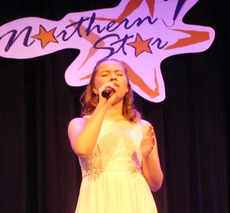 Cady Hebert of Fort Kent was one of two performers, along with Jennifer Raymond, who voters selected to advance to the finale of Northern Star. Hebert and Raymond were among 11 artists who took the stage at the University of Maine at Fort Kent Fox Auditorium during the first round of the United Way sponsored talent competition on Friday, March 3. (Jessica Potila | SJVT/FhF)