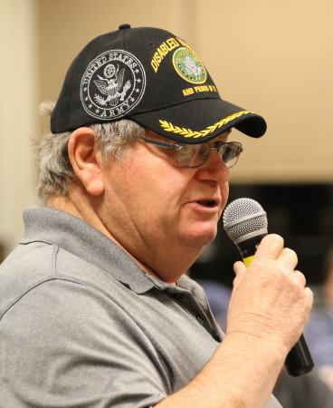 Calvin Hafford of Masardis expressed concern about loss of jobs and environmental issues in Maine's woods to legislators at a Town Hall meeting hosted by Maine Democratic party leaders, Friday March 3, at the University of Maine at Fort Kent. (Don Eno | SJVT/FhF)