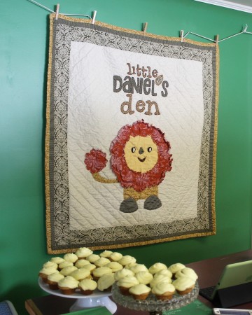 Melanie Daigle, owner of Little Daniel's Den in Fort Kent, custom created a quilt which hangs behind the counter of the store on Monday, March 13. (Jessica Potila | SJVT/FhF)