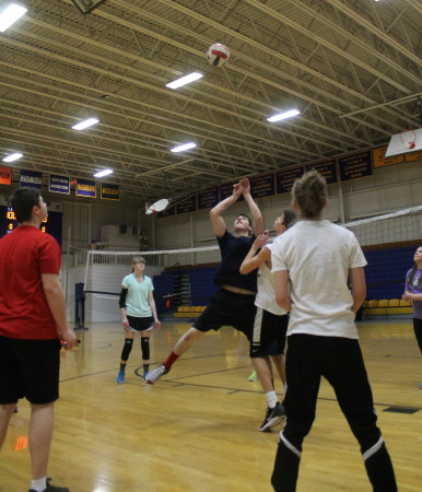 Members of Van Buren District Secondary School’s girls and boys intramural volleyball teams practice, Monday afternoon, March 13, in preparation for taking part in the upcoming annual Aroostook League tournament. The league organizes the tournament each year for schools in the region, who do not have volleyball as a varsity sport. Van Buren’s athletic director, Jay Edgecomb said the sport is played in the fall at other, larger schools downstate. However, that is soccer season in the St. John Valley and Aroostook County, where that sport is “king,” he said. The Crusader girls are scheduled to play in their tournament Friday, March 17, in Washburn. The Boys are set to play, Saturday, in Fort Fairfield. Edgecomb said Van Buren was unable to assemble enough volleyball players last year, but that the school had previously gone to the annual tournament for more than 20 years. Division I teams include Caribou, Fort Kent, Madawaska, Houlton and Presque Isle. Div. II includes Fort Fairfield, Ashland, Central Aroostook, Easton, GHCA, Hodgdon, Katahdin, LCS/MSSM, Van Buren and Wisdom. (Don Eno | SJVT/FhF)
