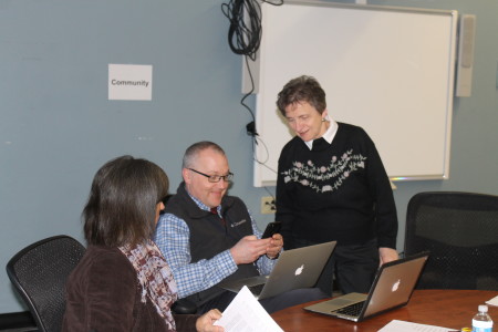 MSAD 33 Superintendent Fern Desjardins, right, talks with MSAD 27 Superintendent Ben Sirois and MSAD 27's Director of Finance and Projects Lucie Tabor, prior to a Tri District Strategic Planning Steering Committee meeting, Monday, March 13, at Fort Kent Community High School. (Don Eno | SJVT/FhF)