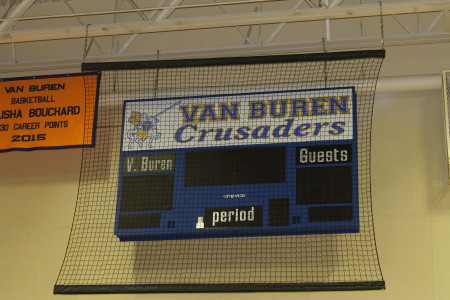 Community businesses and residents donated funds to purchase this new scoreboard, one of two recently installed at the Van Buren Secondary School gymnasium. A larger scoreboard, sponsored by NorState Federal Credit Union, was installed at the other end of the Crusaders' gym. (Don Eno | SJVT/FhF)